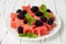 Refreshing watermelon salad with blackberries and mint. Fresh star shaped watermelon.