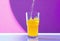 refreshing yellow carbonated drink in a tall glass. Cold glass, drops of condensation, orange juice, lemon juice,