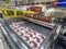 Refrigerated counter with meats for sale in a supermarket in Sao Paulo