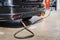 Refueling a black car AT Lpg Gas Filling Station