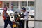 Refueling staff in PTT gas station, fueling up the gas to motorcycle.