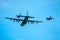 Refueling two jet fighters in-flight