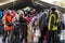 Refugee woman holding her child, a baby, standing in the middle of a crowd on the Croatia Serbia border, on the Balkans Route