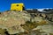 Refugio bivaco on a rocky ridge in the Alps