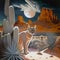 Regal cat in desert under moon by butte and cactus