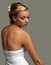 Regal and elegant. Studio shot of an attractive young woman isolated on gray.