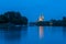 Regensburg with the yacht harbor at the danube river and view to saint peter cathedral at blue hour