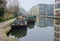 Regents Canal. Morning reflections. Houseboats and offices.