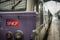 Regional train with the logo of SNCF French Railways on a platform of Paris Gare du Nord Train station.