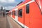 Regional train at outdoor platform railway station in DÃ¼sseldorf, Germany.