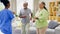 Rehabilitation, exercise and caregiver with senior couple for physical therapy, wellness and fitness. Retirement