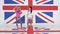 Rehearsal of two cute funny girls dancing on background of UK flag texture.