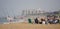 Rehoboth Beach, Delaware, U.S - June 18, 2023 - A group of family hanging out on the surf fishing beach near North Shores