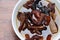 Rehydrated wood ear mushrooms in white bowl, delicacy of Sikkim