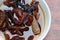 Rehydrated wood ear mushrooms in white bowl, delicacy of Sikkim