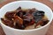 Rehydrated wood ear mushrooms in white bowl, delicacy of Sikkim