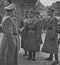 Reichsfuhrer Heinrich Himmler greets others nazis at Prague castle. On the right is Reinhard Heydrich