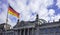 Reichstag building in Berlin, Germany. Under view, part of facade cloudy sky background