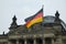 Reichstag building and German Unity Flag