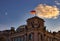 The Reichstag building, seat of the German Bundestag, with a waving flag of the Federal Republic of Germany