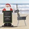 Reindeer and santa claus with text happy holidays on the beach