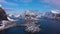 Reine Village and Mountains in Winter. Lofoten Islands, Norway. Aerial View