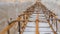 Reinforced belt in wooden formwork at a construction site close up