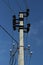 Reinforced concrete poles of power lines against the sky