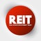 REIT - Real Estate Investment Trust acronym, business concept background