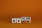 Relapse or reform symbol. Turned wooden cubes and changed the word `relapse` to `reform`. Beautiful orange background. Busines