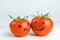 Relationship. emotions on tomatoes. smile and sad