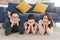 Relax Asian family laying with happy and smile on carpet in living room at home
