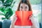 Relax asian woman reading book sitting on sofa in living room holding book to read. Young woman relaxation reader reading open