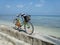 Relax cycling while enjoying the beach atmosphere.