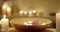Relax, luxury and candles at a massage spa for wellness, peace and meditation. Zen, holistic and a flame from a candle