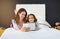 Relax, tablet and mother with child on bed at home watch online video on app, internet or social media. Smile, love and