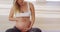 Relax, yoga and rubbing stomach of pregnant woman for workout, health or exercise. Wellness, happiness and pregnancy