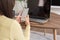 Relaxation concept, Young woman check online sales income on phone while sitting to relax on floor