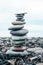 relaxation at sea. Stack of stones on beach - nature background.