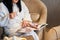 Relaxation and tea party in the spa, a girl in a bathrobe drinks tea