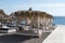 Relaxation zone on the beach between the villages of Perissa and Perivolos in Santorini