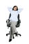 Relaxed businesswoman sitting on office chair