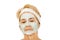 Relaxed elderly woman in facial mask