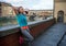 Relaxed fitness woman in front of ponte vecchio