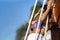 Relaxed and happy woman on a caribbean swing, where she enjoys an excellent panoramic view of the sea of the Mayan Riviera.