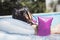 Relaxed little girl with muffs on inflatable mat