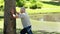 Relaxed mature man making stretching exercises