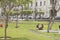 Relaxed people in the pews of the square