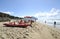 Relaxed people on the Sabaudia beach for the summer holidays. The Circeo Mountain on the background.