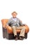 Relaxed senior gentleman sitting in an armchair